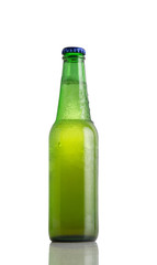 Cold beer bottle isolated on white background