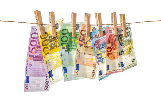 Euro banknotes hanging clothes pins Money background