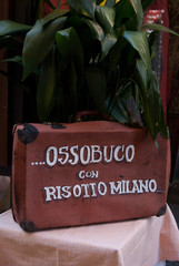 Traditional dish of Milan - typical Italian food exposed outside a restaurant - Italy