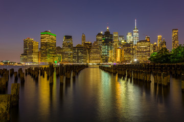 Fototapeta na wymiar View on skyscrapers in lower Manhattan from Brooklyn skyline in New York City at night.