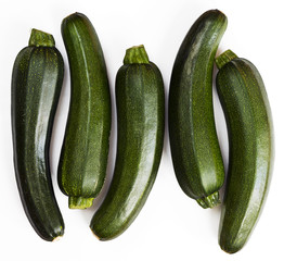 Zucchini (zucchetti, courgettes) on a white background