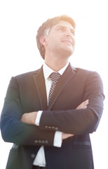 Photo of an attractive businessman with his arms crossed