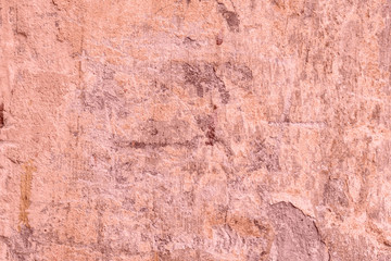 Wall fragment with scratches and cracks