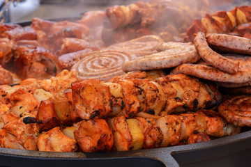 delicious hot meat dishes happy outdoors