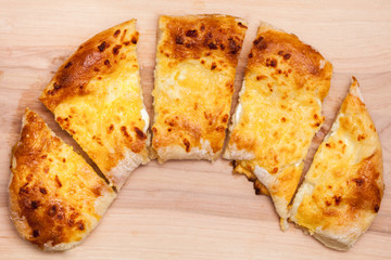 khachapuri (ghvezeli) in a half moon form for christmas day, Georgia
