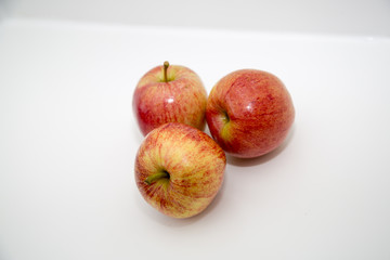 red apples on white background 
