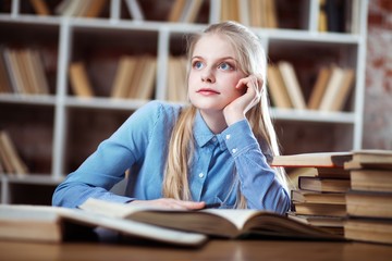 Teenage girl in a library