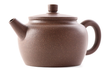 Chinese teaware. Brown clay teapot isolated on white background side view