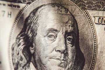 100 dollar bill with President Benjamin Franklin. 