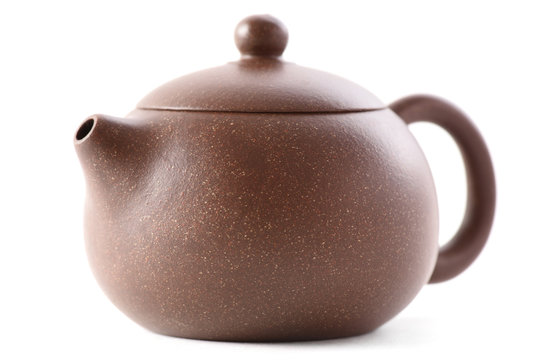Chinese brown clay teapot isolated on white background