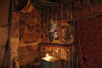 : iconographic scenes and wall murals of saints painted in naive african christian style in Maryam...