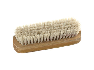 old clothes brush on a white background