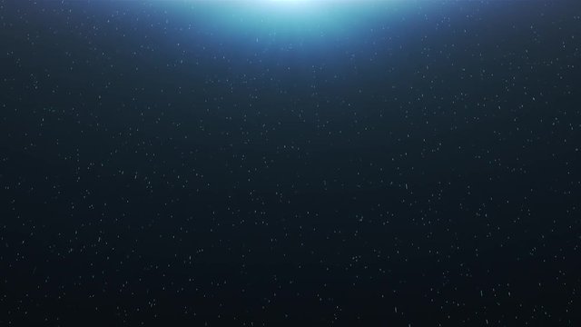 An abstract animation of falling stars on a deep blue background