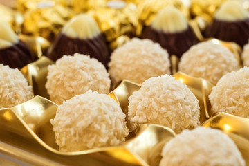 Raffaello white candy with coconut flakes on a box