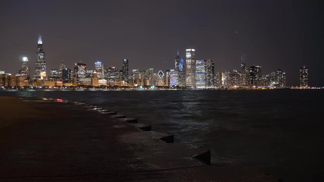 Night timelapse of buildings on the waterfront, Chicago