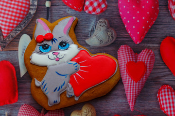 Fototapeta na wymiar gingerbread with drawings of the beast with hearts for the feast of the holy valentine