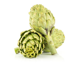 Obraz premium Three globe artichoke set isolated on white background fresh raw green.