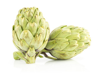 Obraz premium Two globe artichoke isolated on white background fresh raw.