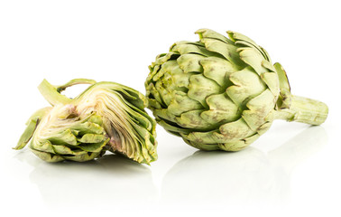 Globe artichoke flower and two slices isolated on white background fresh cut raw.