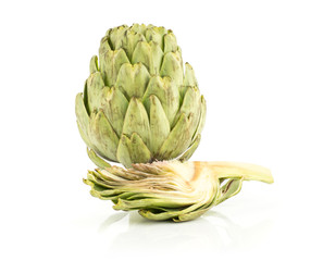 Fototapeta premium Globe artichoke flower and one slice isolated on white background fresh cut raw.