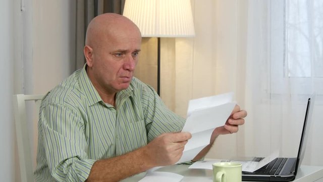 Accountant Looking Invoices Gesturing Upset Disillusioned and Disappointed