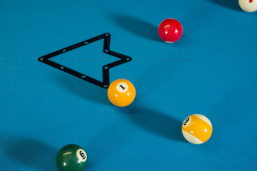 9 ball and 1 ball on a professional pool table for a game of 8 ball.
