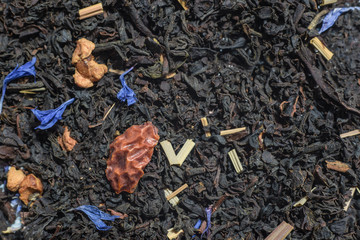 black tea with flowers and fruits