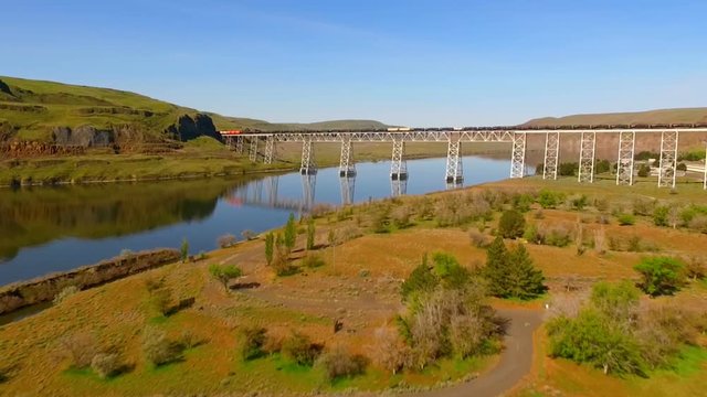 Railroad Bridge Crosses Snake River Carrying Train Washington State
