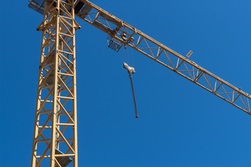 Building Crane On A Blue Sky