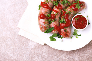 Grilled sausages with lime on iron grill pan