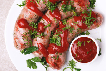 Grilled sausages with lime on iron grill pan