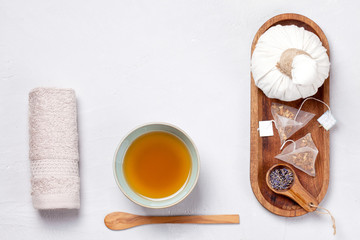 Herbal tea and set of traditional spa products. Natural body care concept