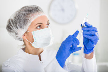 Naklejka premium Nurse making injection