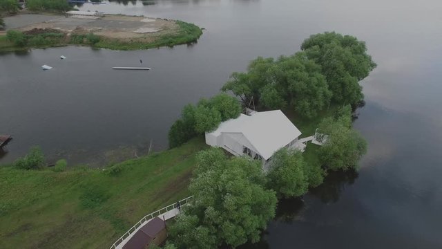 fly over the lake in summer, country house