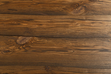 Brown scratched wooden cutting board. Wood texture