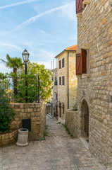 Fototapeta na wymiar Picturesque narrow streets in the old town. Ulcinj, Montenegro.
