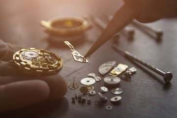 Process of installing a part on a mechanical watch, watch repair