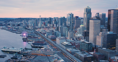 Fototapeta na wymiar Seattle Waterfront Ferry Terminal Downtown Buildings Sunset View