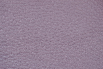 Genuine leather texture, pink lilac color, matte surface, trendy background. Ideal for clothing, footwear, handbags. Concept of shopping, manufacturing