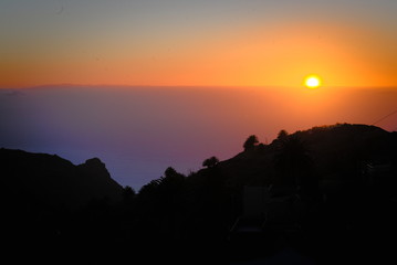 sunset over the clouds