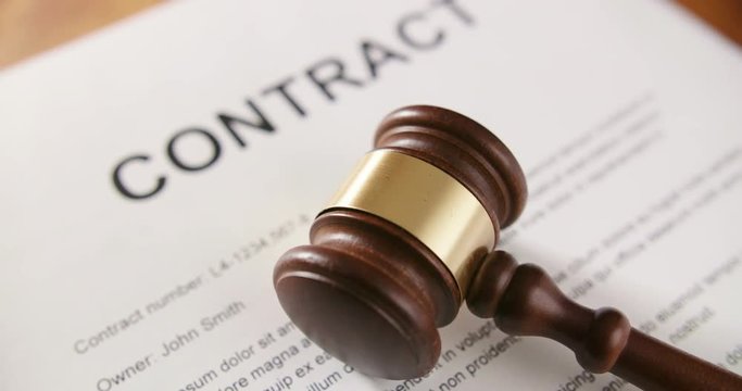 Dolly Shot Of Gavel On Contract Paper At Table 4K