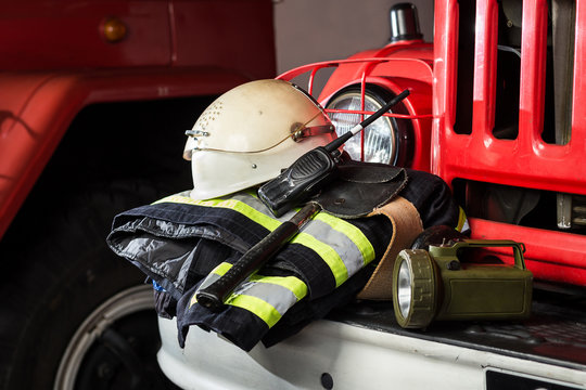 Firemen gear on firetruck such as, special clothing, ration,lamp, helmet and hydrant