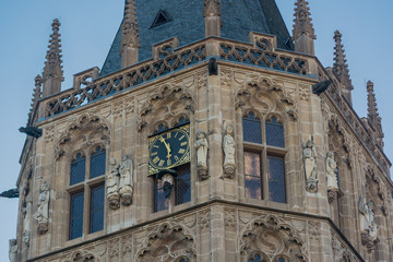 Fototapeta na wymiar Figures at historic town hall of Cologne, Germany