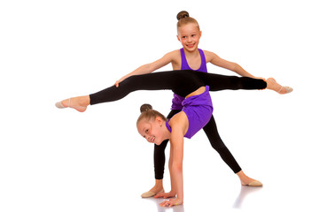 Girls gymnasts on the warm-up.