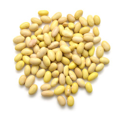 Raw canary beans (peruano beans, yellow beans) on white background