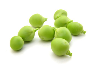 fresh green peas isolated on a white background.