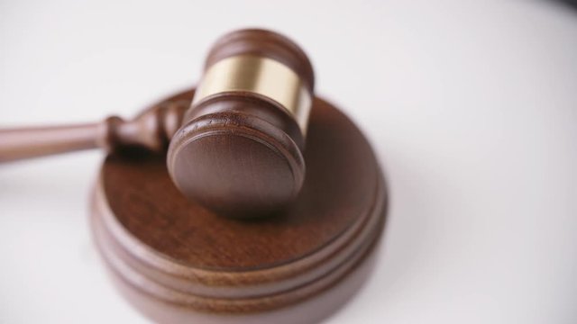 Closeup Dolly Shot Of Wooden Gavel On Sound Block 4K