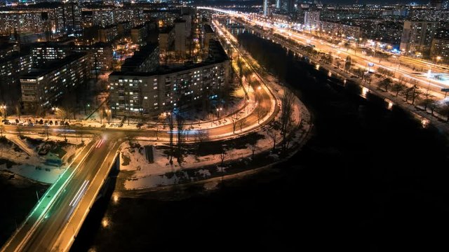 The picturesque view on the evening city with a river. time lapse