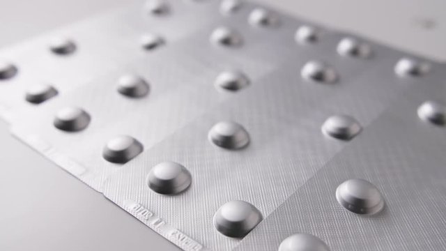 Closeup Of Pills With Blister Package Representing Healthcare 4K