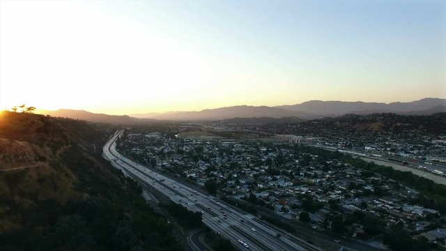 Aerial over the 5 freeway in Los Angeles at sunset